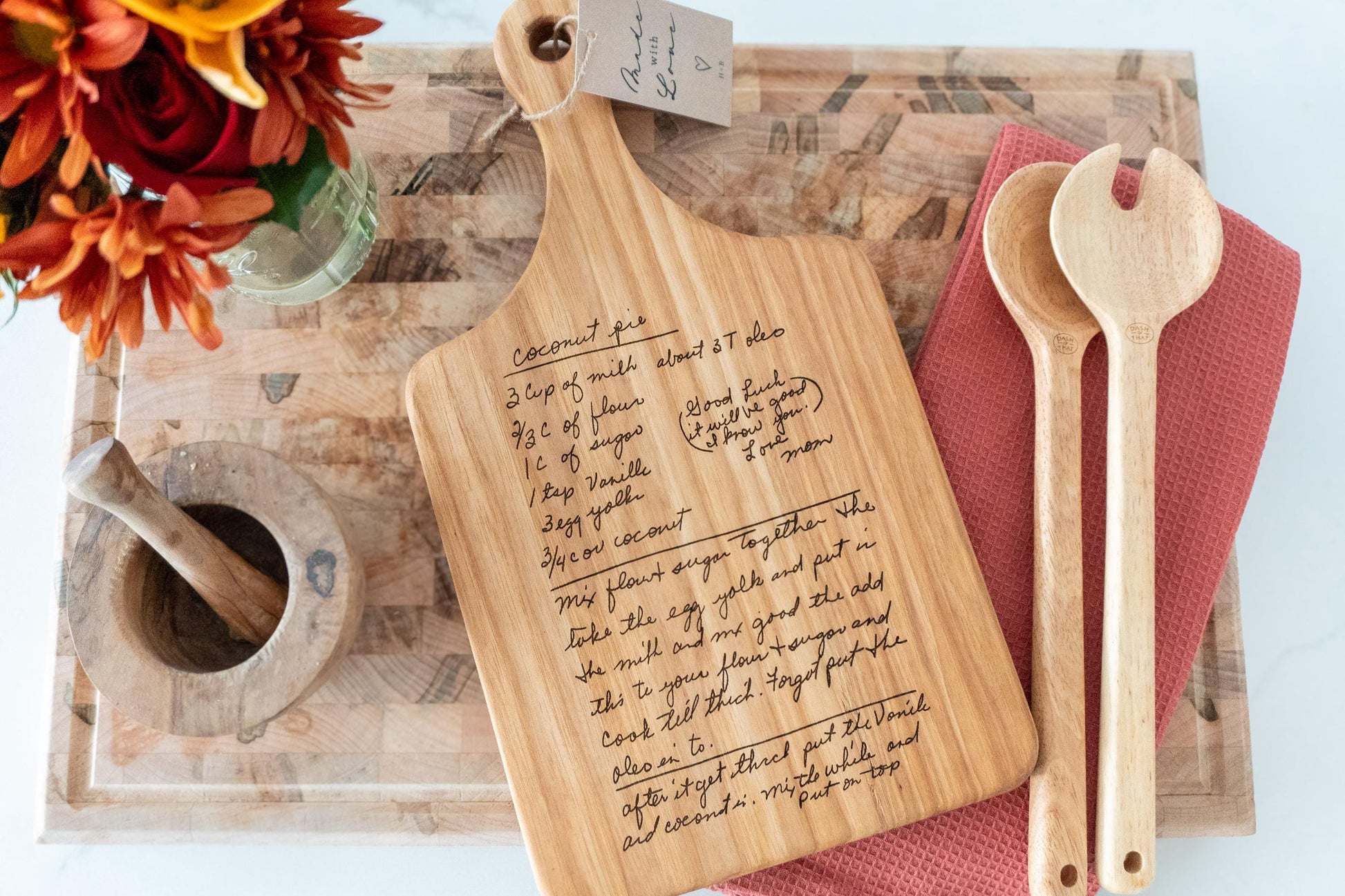 Custom Personalized handwritten recipe display on wood cutting board, perfect for kitchen decor and wall decoration. Laser engraving preserves family heirlooms and grandmother keepsakes as heritage kitchen art. A unique memorial gift idea featuring personalized design and engraving for a timeless display and keepsake.