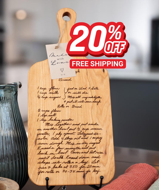 cherry wood recipe cutting board with handwritten recipe engraved